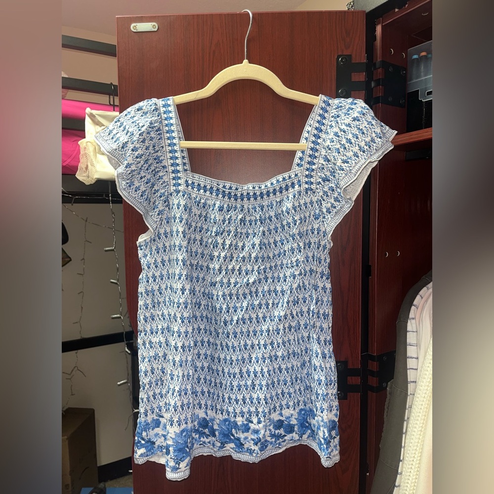 blue and white pattern blouse
